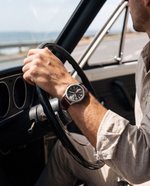 Clicöt Atlas 41mm men's watch in grey and brown, worn on a man's left wrist