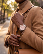 Clicöt Becky 36mm watch in pink and silver on a woman's left wrist, everyday lifestyle photo