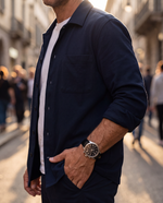 Clicöt Robin 42mm men's watch in black and silver, worn on a man's left wrist