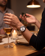 Clicöt Selene 36mm women's watch in silver, worn on a woman's left wrist