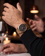 Clicöt Thor 42mm men's watch in black and gold, worn on a man's left wrist