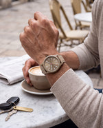 Clicöt Zeus 41mm men's watch in beige, worn on a man's left wrist